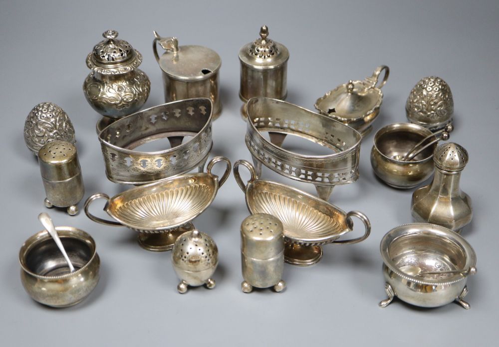 A collection of silver condiments, including a William IV foliate-embossed pepper approx 21.25oz